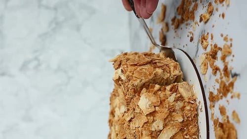 Serving a Delicious Cake with Silver Utensil