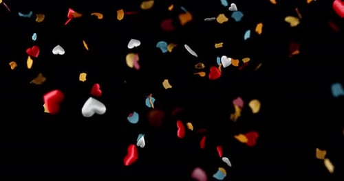 Colorful Heart and Star Confetti Falling on Black