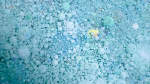 Slow Motion of Bright Colored Bubbles