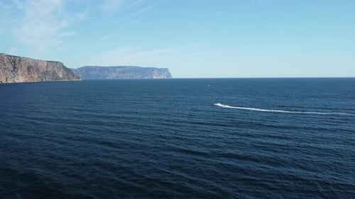 Speedboat Cruising across the Ocean