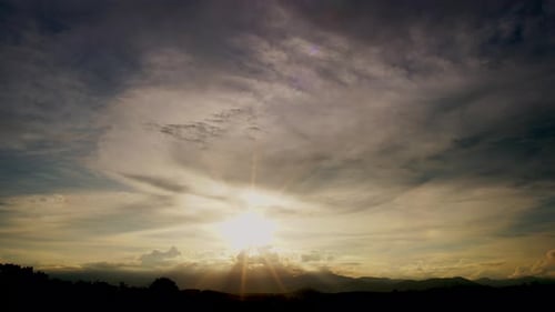Dramatic Cumulus tropical cinematic cloudscape building up over the mountain turning into a tropical