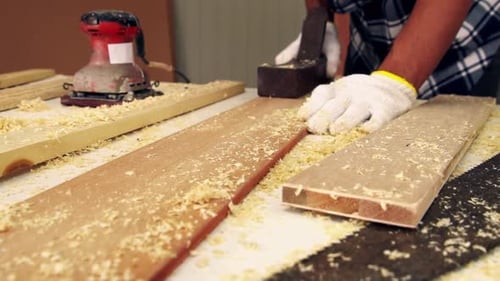 Carpenter Working on Wood Craft at Workshop