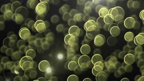 Animation of yellow circles and shiny bokeh