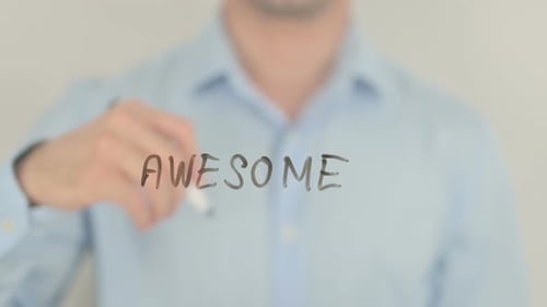Hand Writes Awesome on Clear Surface