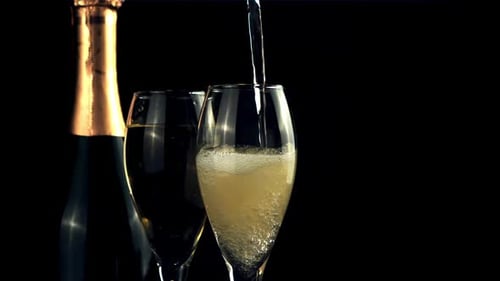 Champagne Poured into Glass for Celebration