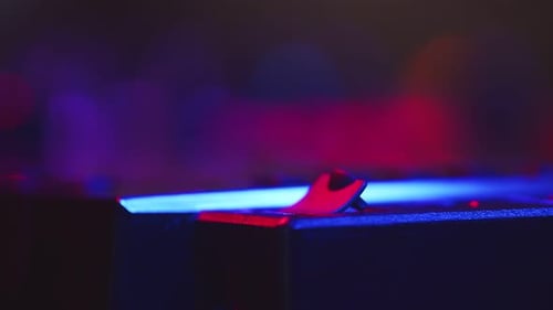 DJ Inserts Bluetooth Receiver Into USB Connector on Mixing Console to Connect Equipment Closeup