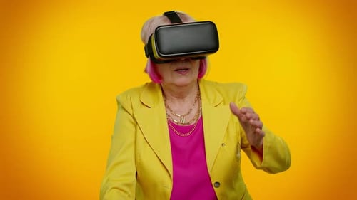Senior Woman Using Virtual Reality Headset