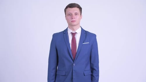 Smiling Man in Blue Suit