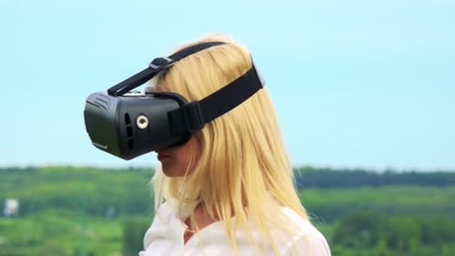 Woman Using Virtual Reality Headset in Nature