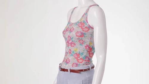 Rotating Mannequin in Floral Top.