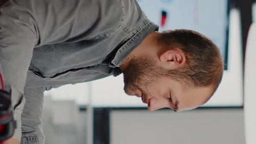 Focused Man Working in an Urban Office Setting
