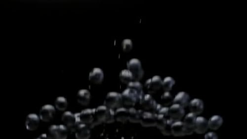 Fresh Blueberries Falling in Slow Motion on Black