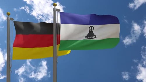 Germany and Lesotho Flags Waving in Blue Sky 3D Animation