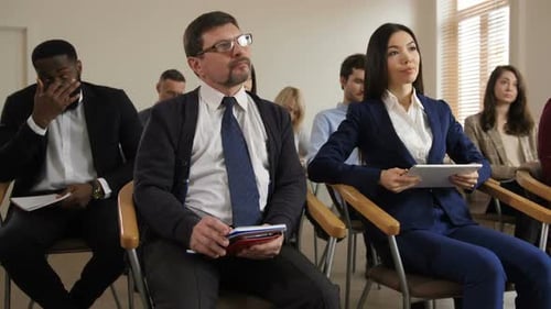 Adults Attending Business Meeting or Seminar