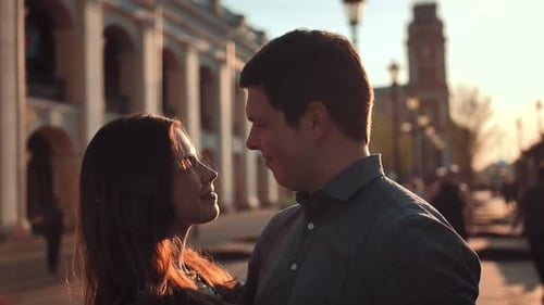 Handsome Man and Young Woman Having Fun in the City