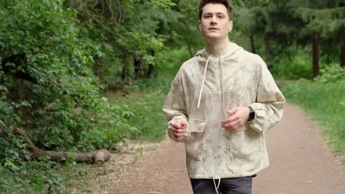 Man Jogging in Park for Health and Fitness