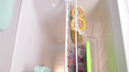 Removing Frozen Vegetables From Freezer in Silicone Bag