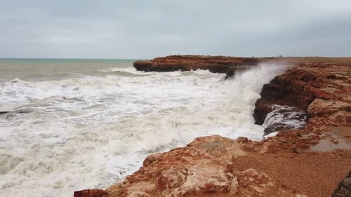 Large Waves Crash Ashore As Sea Storm Hits Island