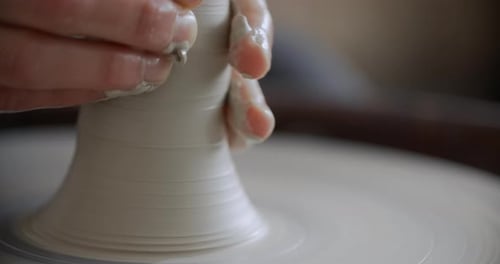 Close Up View Potter Sculpts on a Potter's Wheel Video From Pottery Workshop Potter Makes Ceramics