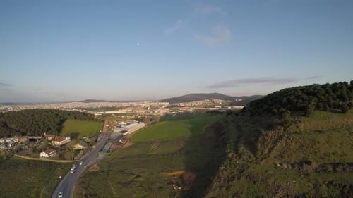 Aerial Green Hill and Road
