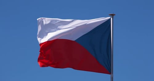 Czech Republic Flag Waving Against a Blue Sky