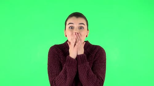 Very Surprised Girl with Shocked Wow Face Expression . Green Screen