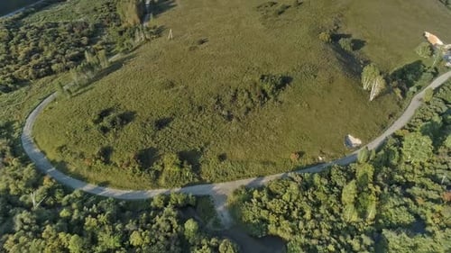 road between green hills