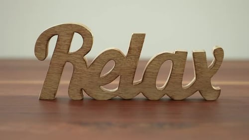 Wooden Relax Sign on Table