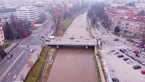Drone Flying Over Miljacka River In Sarajevo
