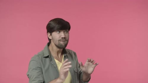 Man Gesturing and Interacting with Invisible Interface