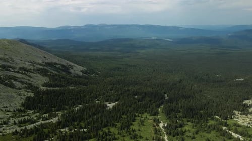 View from the top to the mountain and the valley