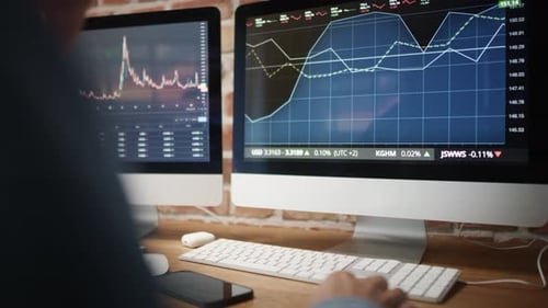 Close up of screen of computer with stock market data. Shot with RED helium camera in 8K