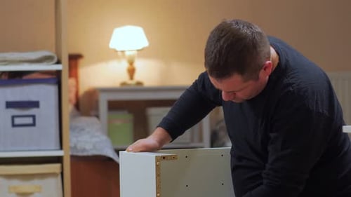 Man Assemble Furniture