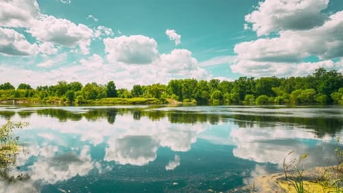Summer Cloudy Sky Above Summer River Landscape Lake