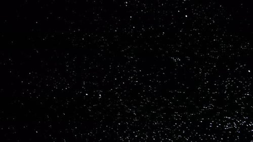 Twinkling White Specks on Black Background