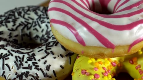 Colorful Iced Donuts with Sprinkles Close Up