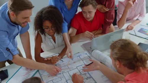 People Working with Blueprint in Office