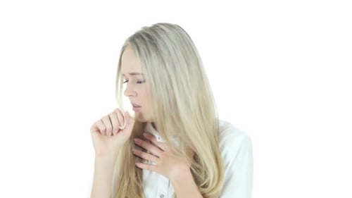 Young Woman Coughing Against White Background