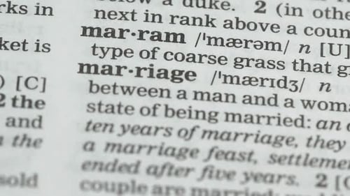 Pencil Pointing at Marriage Definition in Dictionary