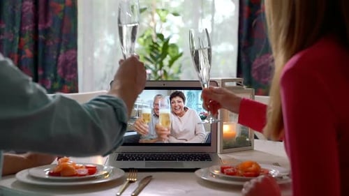 Family Celebrates Online With Champagne Toast