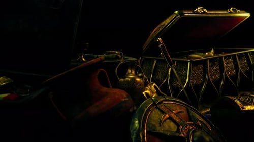 Des bijoux et des pièces d'or dans le noir