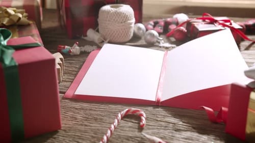Top view of christmas greeting card on wooden table