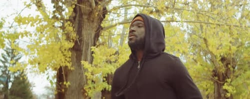 African American Man Running in Park