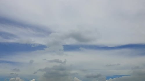 Time lapse of white cloud moving pass around sky background