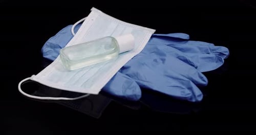 Medical Protective Equipment on Black Surface