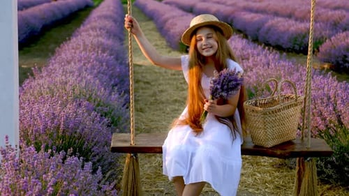 Girl on Swing in Lavender Field