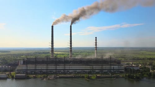 Aerial View of Coal Power Plant High Pipes with Black Smokestack Polluting Atmosphere