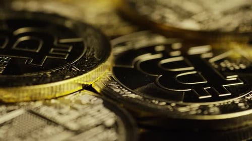 Close-Up Dolly Shot of Bitcoin Coins