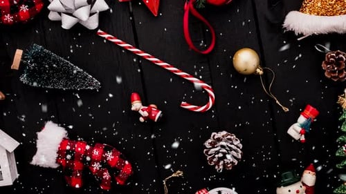 top view flatlay of present gift boxes with red color and ribbon wrap on texture floor