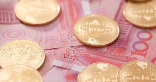 Bitcoins and Yuan Symbolize Modern Finance and Investment